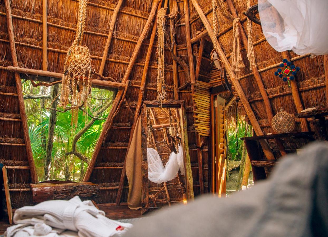 Ikal Tulum Hotel Zewnętrze zdjęcie Interior of a hut at the resort