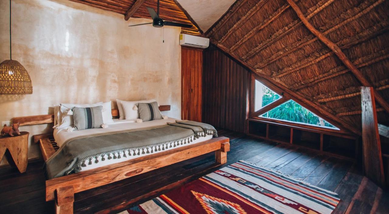 Ikal Tulum Hotel Zewnętrze zdjęcie A bedroom at the hotel